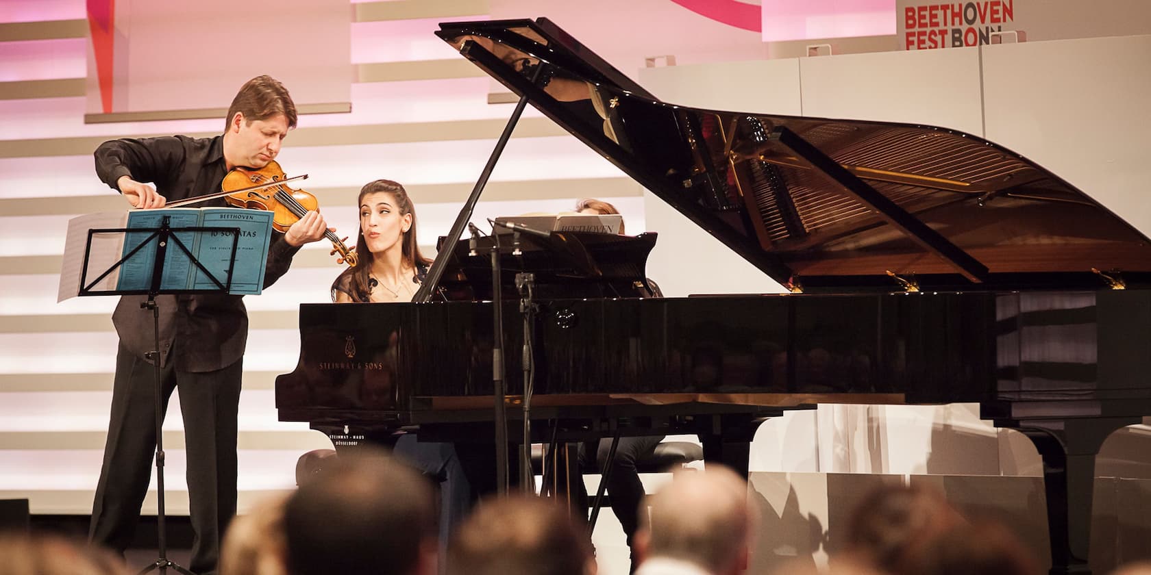 A violinist and a pianist perform at the Beethoven Festival.