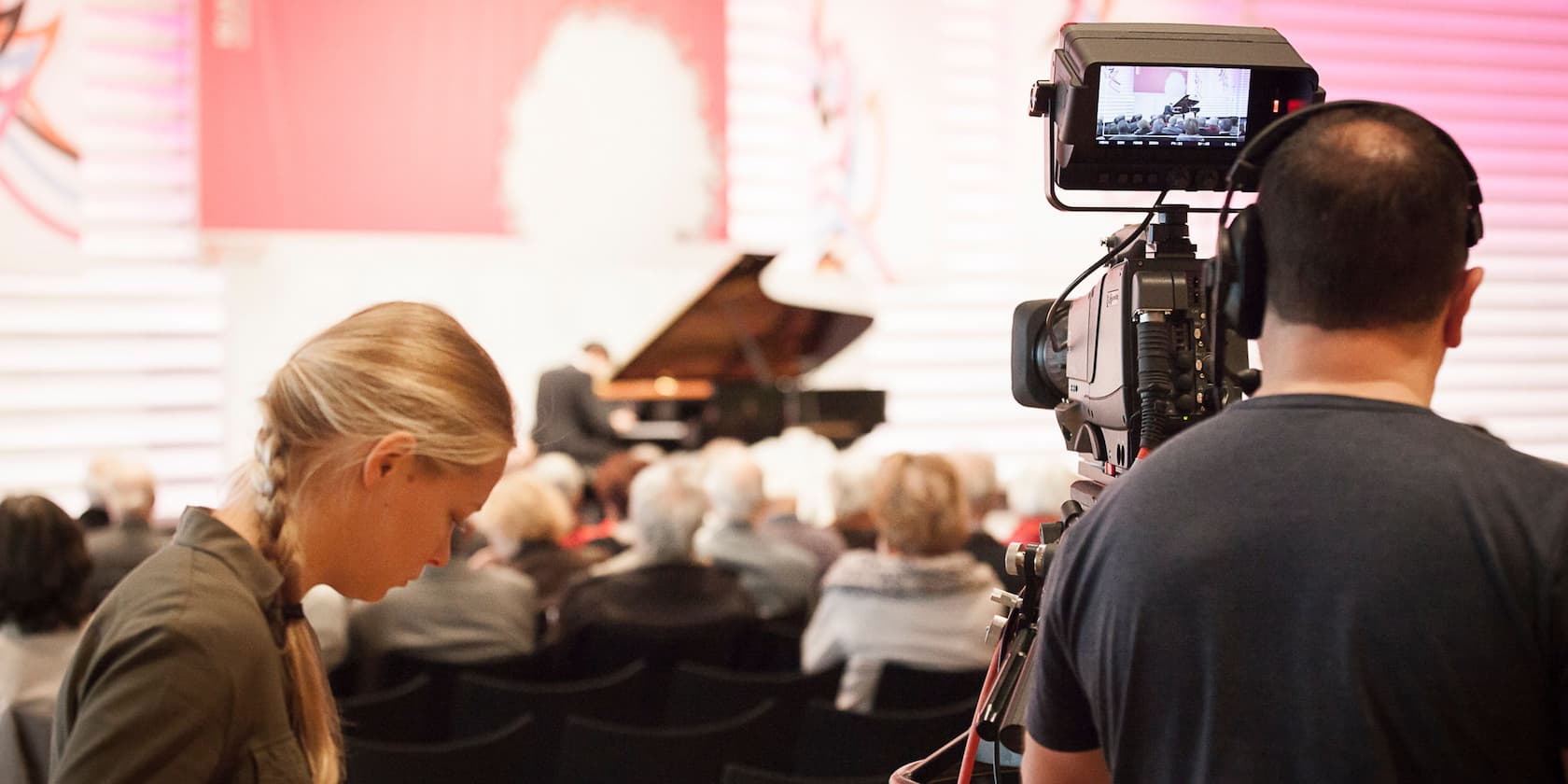 Camera crew recording a piano performance