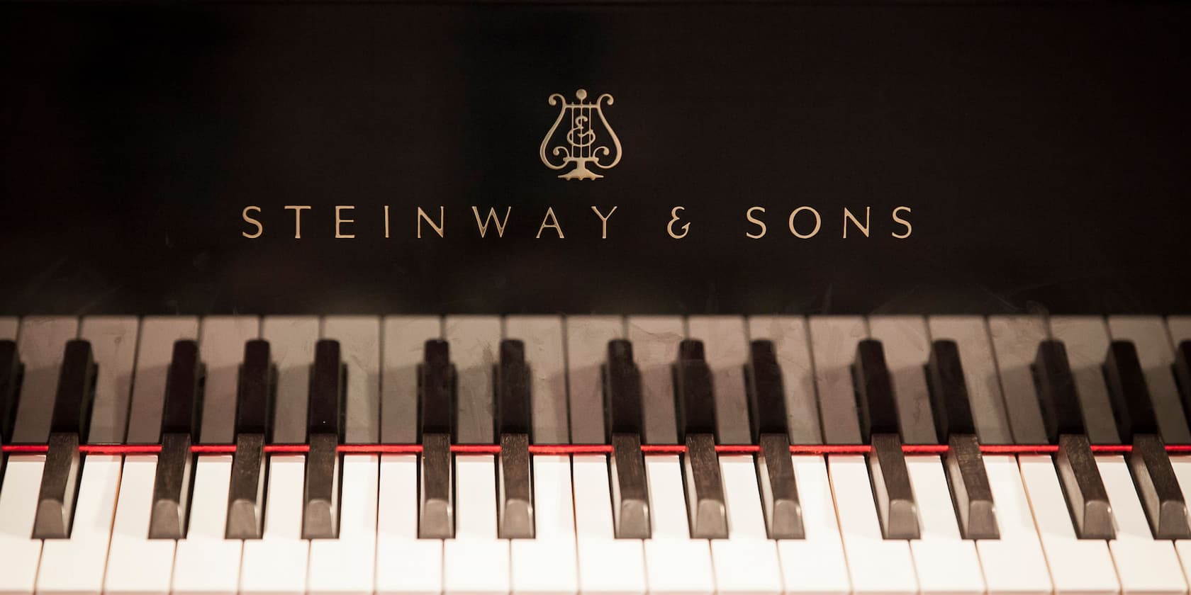 Steinway & Sons logo on a piano